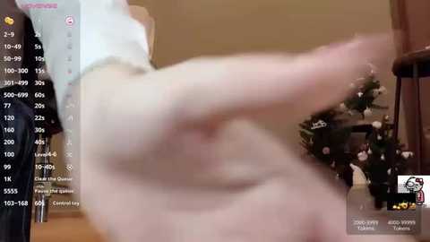 A blurry video of a person, possibly a man, lying on a bed, with a live stream overlay featuring a chat box and viewers' comments.