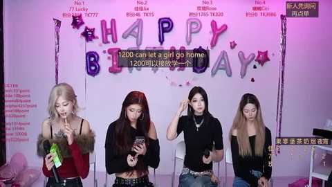 Video of four young women with varying hairstyles and clothing, standing against a pink backdrop with \"Happy Birthday\" text and digital numbers. They are in a studio setting, celebrating a birthday.