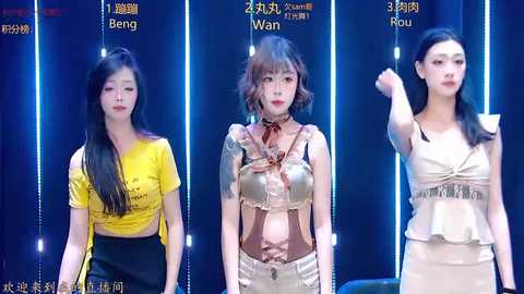 Video of three Asian women with different hairstyles and outfits in a dimly lit room.