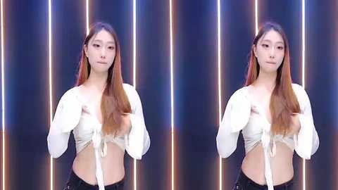 Video of an East Asian woman with long, straight brown hair, wearing a white, lacy crop top with long sleeves, against a dark, vertical-striped background.