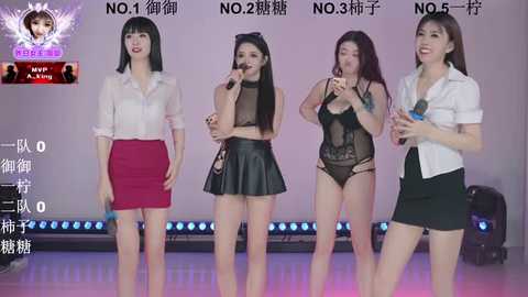 Media: Video of four Asian women in various outfits singing on stage, background with Chinese text, studio setting, lively atmosphere.