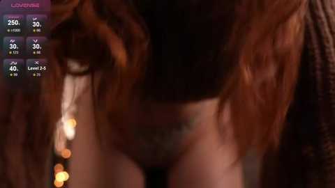 A blurred video shows a person's torso and upper thighs, partially obscured by a dark background. The person's skin tone appears fair, and the image includes a text overlay with health and fitness stats.