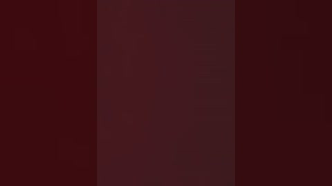 Media: A digitally rendered image featuring a gradient transition from deep maroon to a lighter maroon shade, creating a smooth, monochromatic background with no discernible objects or figures.
