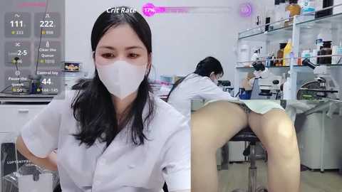 A video shows an Asian woman in a white lab coat and mask, standing in a sterile lab. Another woman, bent over a microscope, has her lab coat lifted, exposing her bare buttocks.