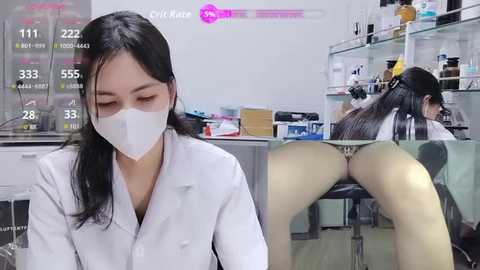 Video of an Asian woman with long black hair, wearing a white lab coat and mask, in a medical lab setting. She is kneeling, exposing her buttocks.