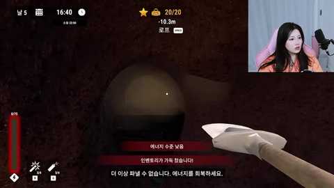 Media: A video of a virtual reality scene featuring a woman in an orange sweater, holding a pillow, inside a dark tunnel. A live video feed shows a man in the background.