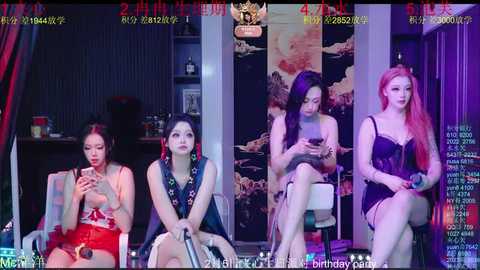 Video of four East Asian women, each dressed in provocative attire, seated in a dimly lit room. The background features a Japanese painting and a TV screen.