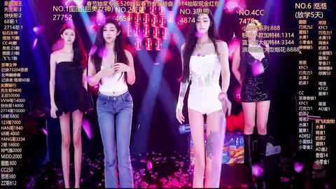 Video of four Asian women on a runway, dressed in strapless, form-fitting black and white outfits, surrounded by vibrant stage lights and a blurred audience.