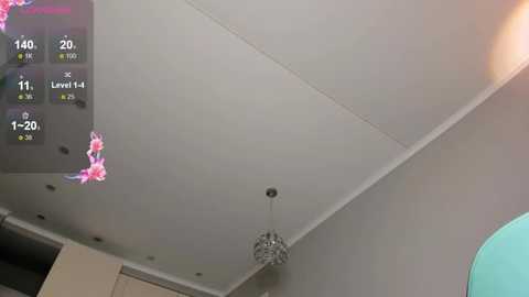 Video of a modern ceiling with a hanging, intricate chandelier, showing a virtual reality game screen overlay with character and level stats.