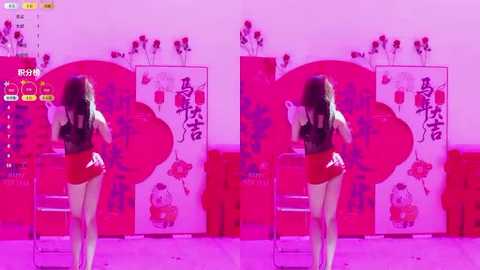 A video of a young woman with long, wavy hair in a red dress performing in front of a red heart backdrop with Chinese characters.