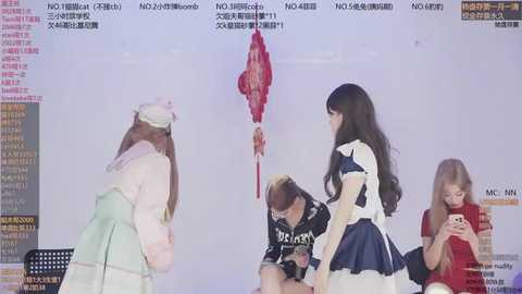 A video of a digital screen displaying a live stream of a Japanese anime character in a maid outfit, interacting with a young girl, and a boy in a crowd.