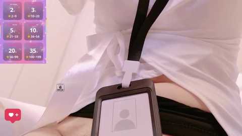 Media: A video showing a person wearing a white lab coat with black straps holding a smartphone, displaying a purple digital menu with 20 options.